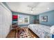 Bedroom with hardwood floors, natural light, and water view at 8488 35Th N Ave, St Petersburg, FL 33710