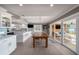 Spacious open-concept dining area seamlessly connects the kitchen with the outdoor living space at 8488 35Th N Ave, St Petersburg, FL 33710