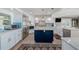Modern kitchen featuring white cabinetry, a center island, and stainless steel appliances at 8488 35Th N Ave, St Petersburg, FL 33710
