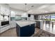 Modern kitchen featuring a large island, stainless steel appliances, and an open layout at 8488 35Th N Ave, St Petersburg, FL 33710