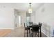 Cozy dining area with tile flooring, seamlessly connecting to other rooms in the house at 10260 Devonshire Lake Dr, Tampa, FL 33647