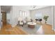 Cozy, staged living room featuring neutral-toned furniture, perfect for relaxation and conversation at 10260 Devonshire Lake Dr, Tampa, FL 33647