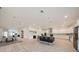Open-concept kitchen with large island, pendant lighting, stainless appliances, and ample counter space at 1033 Hammock Cir, Tarpon Springs, FL 34688