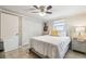 This bedroom features bright natural light, closet space, and neutral walls and flooring at 10817 Kingsbridge Rd, Port Richey, FL 34668