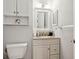 This bathroom has a vanity, a sink, and a toilet at 11536 Baywood Meadows Dr # 3, New Port Richey, FL 34654