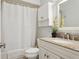 The bathroom is nicely appointed with a shower, sink, and vanity at 11536 Baywood Meadows Dr # 3, New Port Richey, FL 34654