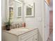 The bathroom features a vanity with a granite countertop and white cabinets at 11536 Baywood Meadows Dr # 3, New Port Richey, FL 34654