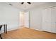 This bedroom features wood floors, natural light, and a closet at 11536 Baywood Meadows Dr # 3, New Port Richey, FL 34654