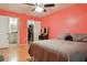This bedroom has a ceiling fan, ensuite bathroom, and a bed at 11536 Baywood Meadows Dr # 3, New Port Richey, FL 34654