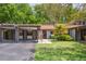 Charming single-story home with a covered parking and a cozy front yard and landscaping at 11536 Baywood Meadows Dr # 3, New Port Richey, FL 34654