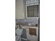 Bathroom needing repair with bare walls and exposed plumbing at 119 18Th Nw St, Ruskin, FL 33570