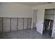 Bedroom needing repair featuring tile flooring and unfinished walls at 119 18Th Nw St, Ruskin, FL 33570
