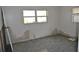 A bedroom in need of repair with peeling paint and damaged walls at 119 18Th Nw St, Ruskin, FL 33570