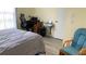 Bright bedroom featuring a desk, printer, and a neutral color scheme at 12328 Shafton Rd, Spring Hill, FL 34608
