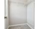 Walk-in closet providing shelving for storage and organization at 12443 Country White Cir, Tampa, FL 33635