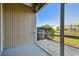 Enclosed screened lanai overlooking the pond and A/C Unit, ideal for quiet enjoyment of the outdoor scenery at 12443 Country White Cir, Tampa, FL 33635