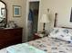 Cozy bedroom with a view of the closet, and an ornate dresser with a large mirror at 12478 Capri Circle N # 2, Treasure Island, FL 33706