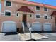 Charming townhouse with garage and red roof at 12478 Capri Circle N # 2, Treasure Island, FL 33706