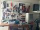 Garage setup with tools, workbench, and pegboard, perfect for DIY projects and home repairs at 12478 Capri Circle N # 2, Treasure Island, FL 33706