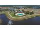 Community swimming pool and recreation center with a lake at 13506 Wild Ginger St, Riverview, FL 33579