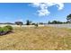 Picture of the backyard featuring a central fire pit with room for recreational activities at 13506 Wild Ginger St, Riverview, FL 33579