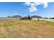 Large backyard is surrounded by a white fence for extra privacy at 13506 Wild Ginger St, Riverview, FL 33579
