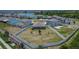 Aerial view of a fenced-in backyard with green grass at 13506 Wild Ginger St, Riverview, FL 33579