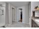 Bathroom showcasing a walk-in shower and an open doorway to a walk-in closet at 13506 Wild Ginger St, Riverview, FL 33579