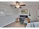 Bedroom showcasing a large white whiteboard and wood look flooring throughout at 13506 Wild Ginger St, Riverview, FL 33579