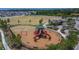 Community playground with swings and climbing structures at 13506 Wild Ginger St, Riverview, FL 33579