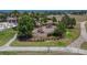 Aerial view of a community playground with green space and sidewalks at 13506 Wild Ginger St, Riverview, FL 33579