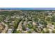 Beautiful waterfront community featuring lush landscaping, mature trees, and stunning scenery at 13891 Feather Sound Dr, Clearwater, FL 33762