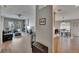 View of connected living spaces with abundant natural light and luxury vinyl plank flooring at 1406 Bloomingdale Trails Blvd, Brandon, FL 33511