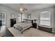 Neutral main bedroom with vaulted ceilings, carpet flooring, and plenty of natural light at 1406 Bloomingdale Trails Blvd, Brandon, FL 33511