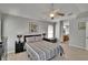 Comfortable main bedroom with soft carpet, and an attached bathroom at 1406 Bloomingdale Trails Blvd, Brandon, FL 33511