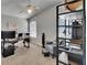 Office space featuring a spacious desk, comfortable seating, a ceiling fan, and shelving for storage at 1406 Bloomingdale Trails Blvd, Brandon, FL 33511