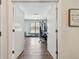 Home gym featuring exercise equipment, wood floors and great light at 14078 Leeward Dr, Seminole, FL 33776