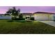 Well-maintained lawn, manicured shrubs, and a charming one-story home create a welcoming curb appeal at 14078 Leeward Dr, Seminole, FL 33776