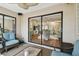 Screened porch overlooks the connected indoor and outdoor living and dining spaces at 14078 Leeward Dr, Seminole, FL 33776