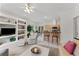 Open floor plan connecting the living room, breakfast nook and kitchen areas at 15703 Walden Ave, Tampa, FL 33618