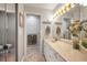 Bathroom with shower and tub, vanity with granite countertops, and decor at 1647 Hamilton Ct, Dunedin, FL 34698