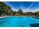 Inviting community pool with ample space for lounging and recreation at 1647 Hamilton Ct, Dunedin, FL 34698
