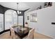 Inviting dining space featuring a modern chandelier and charming decorative details at 1647 Hamilton Ct, Dunedin, FL 34698