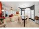 Open-concept living and dining area with a cohesive and inviting design at 1647 Hamilton Ct, Dunedin, FL 34698