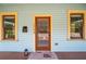 Inviting front door with a decorative welcome mat and classic architectural details at 1708 E 15Th Ave, Tampa, FL 33605