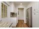 Updated kitchen with granite countertops and stainless steel refrigerator at 19266 Campground Rd, Brooksville, FL 34601