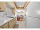 Functional kitchen with ample countertop space and a view into the adjacent dining area at 2060 Attache Ct, Clearwater, FL 33764