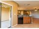 Eat-in kitchen features granite countertops and black dishwasher at 2453 Edgewater Falls Dr, Brandon, FL 33511