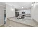 Kitchen features granite countertops, stainless steel appliances, and white cabinetry, offering a modern feel at 2722 11Th Ct # 50A, Palm Harbor, FL 34684