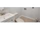 Functional laundry room features essential fixtures and tile flooring at 2722 11Th Ct # 50A, Palm Harbor, FL 34684
